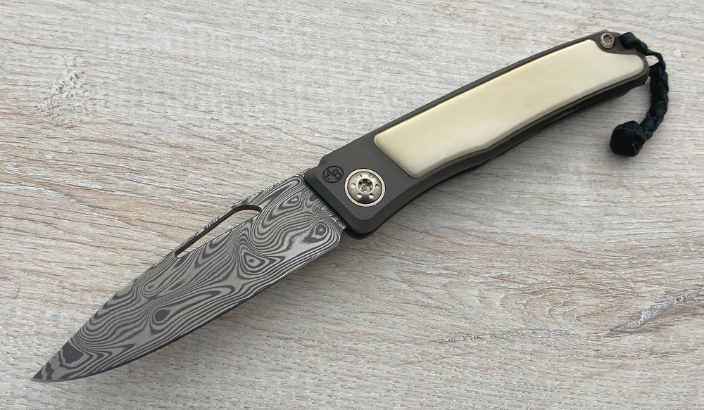 Rinkhals Damasteel Rose in Warthog Ivory: African Sporting Creations